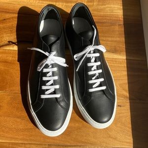 BRAND NEW Common Projects Sneakers. Black Leather. Size 45 EU. Size 11.5 US.